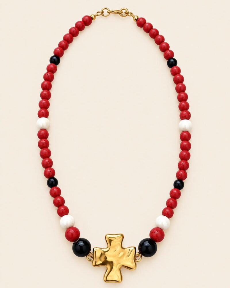 Collar VENUS de coral negro y blanco con cruz en oro brillo